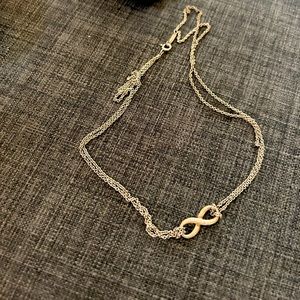 Tiffany infinity necklace . Comes with dust bag.